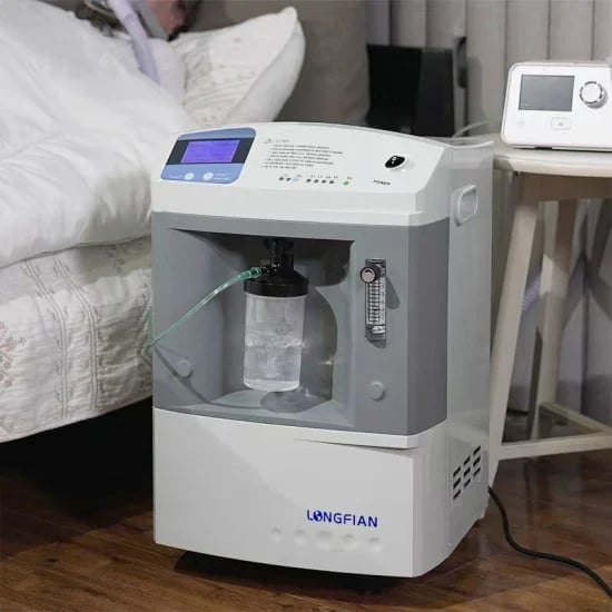 Longfian oxygen concentrator machine with digital display in bedroom next to bed and thermostat control